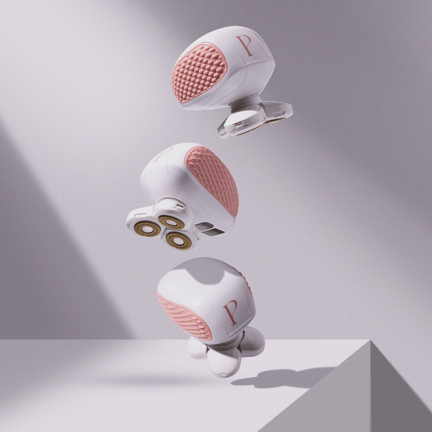 PosheEra handheld electric razor with a stylish pink and white design, featuring rotary blades and textured grip for a comfortable, irritation-free shave.