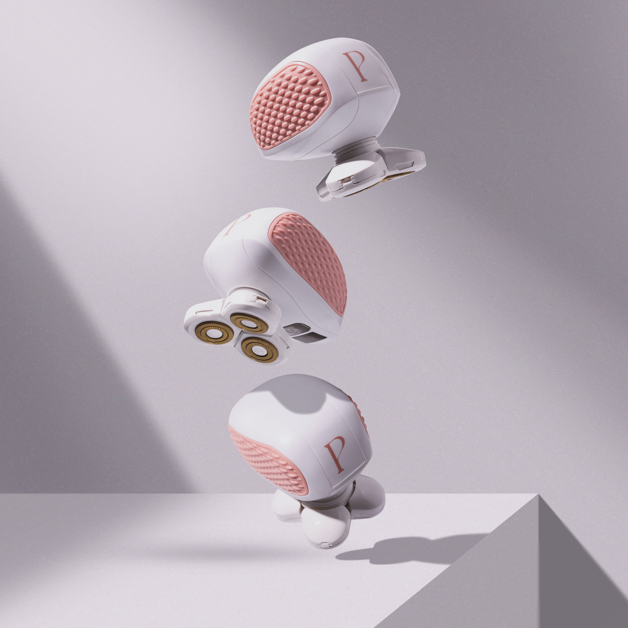 PosheEra handheld electric razor with a stylish pink and white design, featuring rotary blades and textured grip for a comfortable, irritation-free shave.