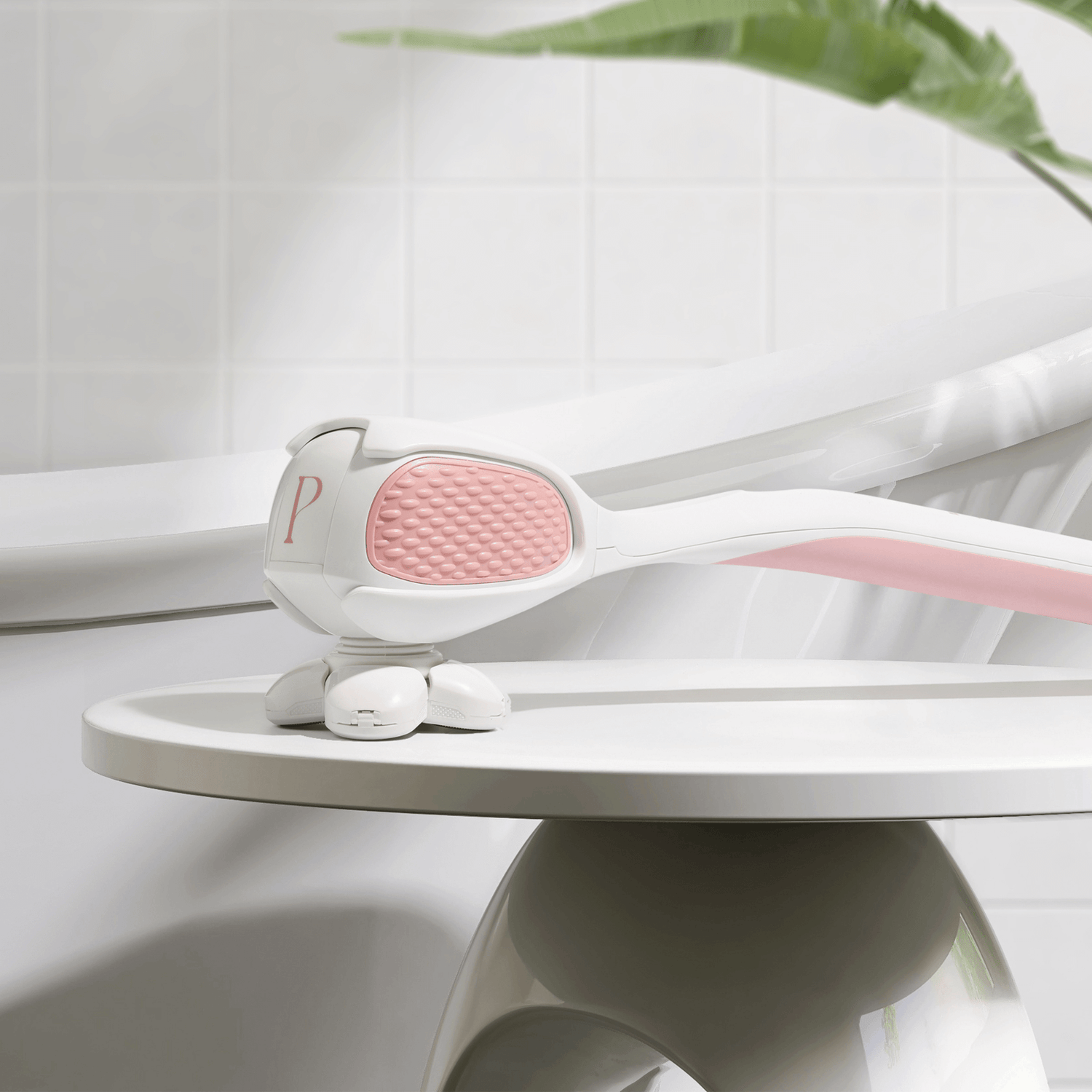 PosheEra electric razor resting on a luxury bathroom counter, highlighting its elegant design, ergonomic handle, and travel-friendly, rechargeable functionality.