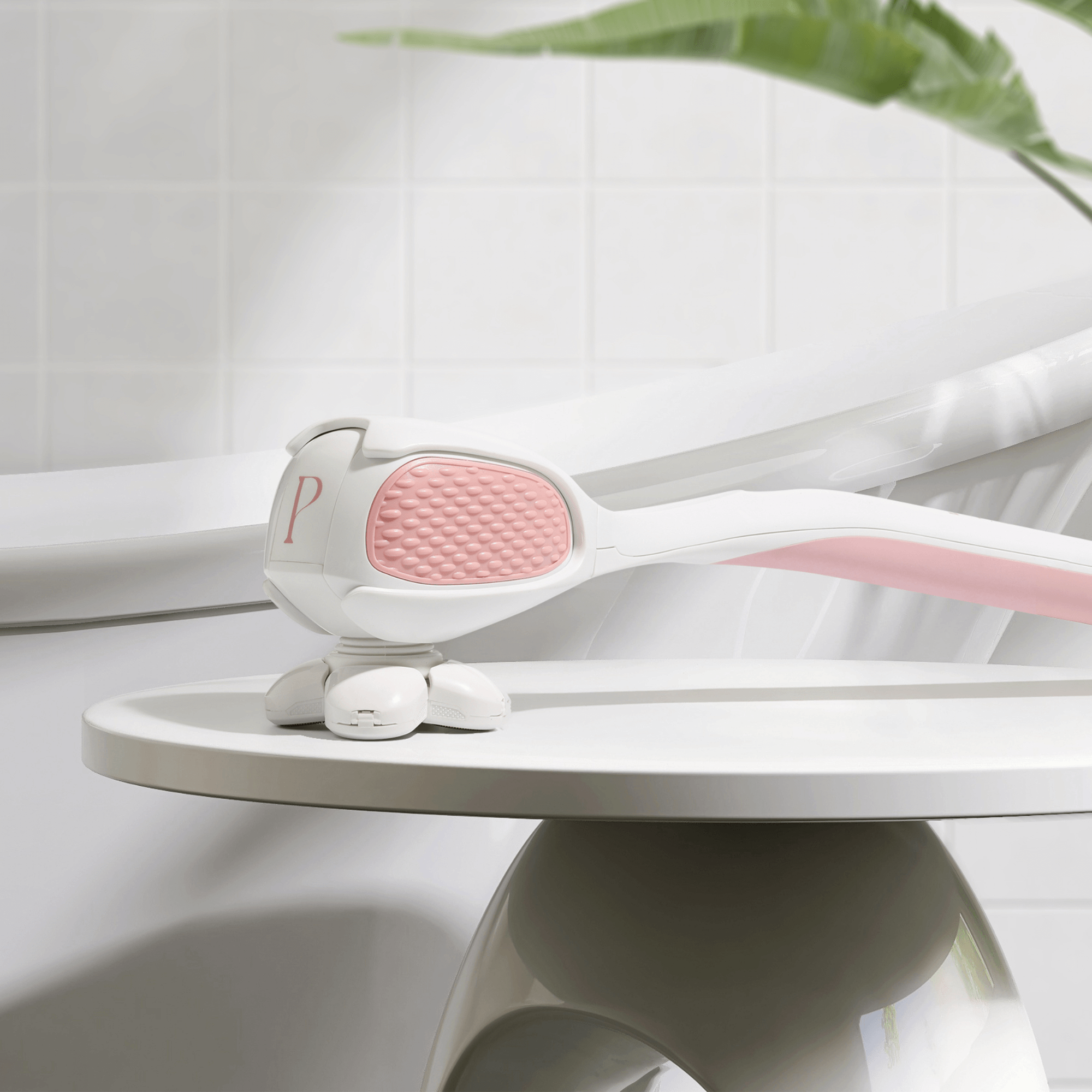 PosheEra electric razor resting on a luxury bathroom counter, highlighting its elegant design, ergonomic handle, and travel-friendly, rechargeable functionality.
